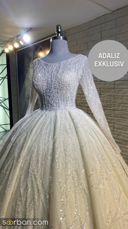 لباس عروس عربی 1402 با تزیناتبسیار پر کار و زرق برق