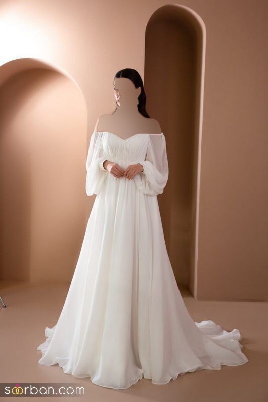25 مدل لباس عروس شانه افتاده آستین دار 2023  یقه قایقی باز و دلبرونه