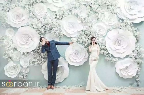 تزیین پشت سر عروس و داماد برای عروسی 2017 با گل های کاغذی دیواری