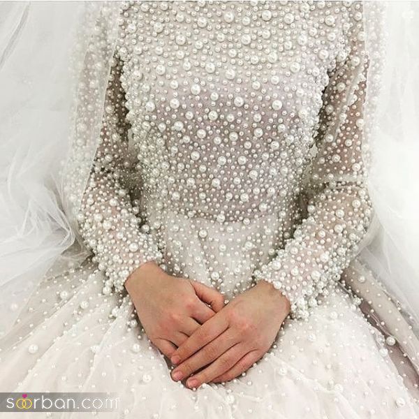 لباس عروس پوشیده مروارید دار