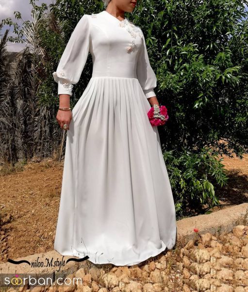 ( لباس فرمالیته پوشیده  )