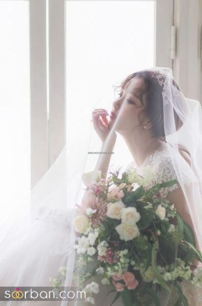 عکس تکی عروس با دسته گل 