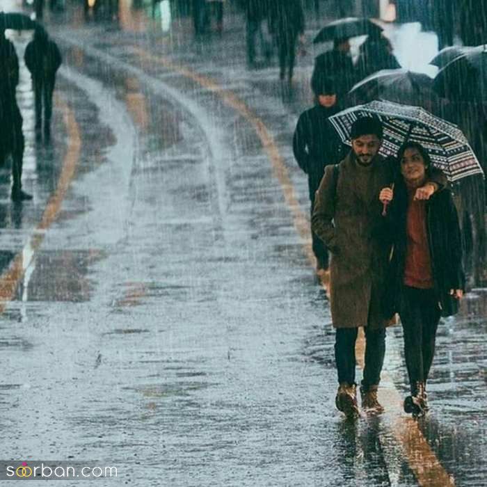 تصاویری از جدیدترین ایده های عکاسی عروس و داماد زیر باران تصاویری از جدیدترین ایده های عکاسی عروس و داماد زیر باران
