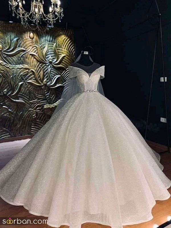 جدیدترین لباس عروس دکلته 1402 را اینجا مشاهده بفرمایید! (شاین دار)